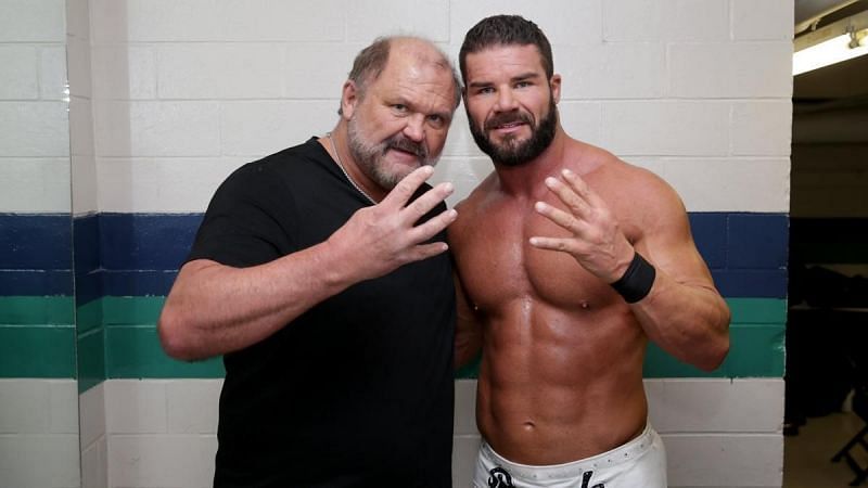 The Enforcer poses with a man many compare to him, Bobby Roode.