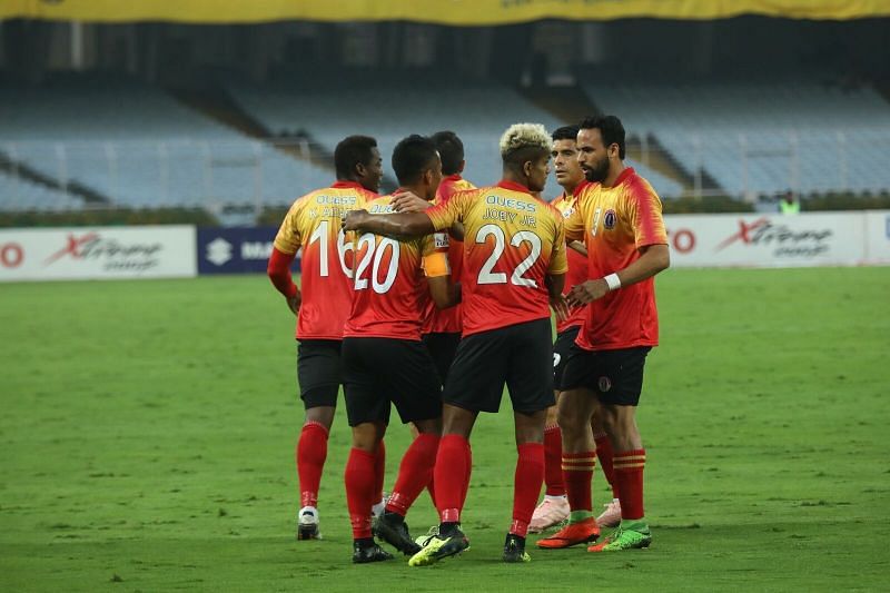 East Bengal players celebrate after scoring a goal