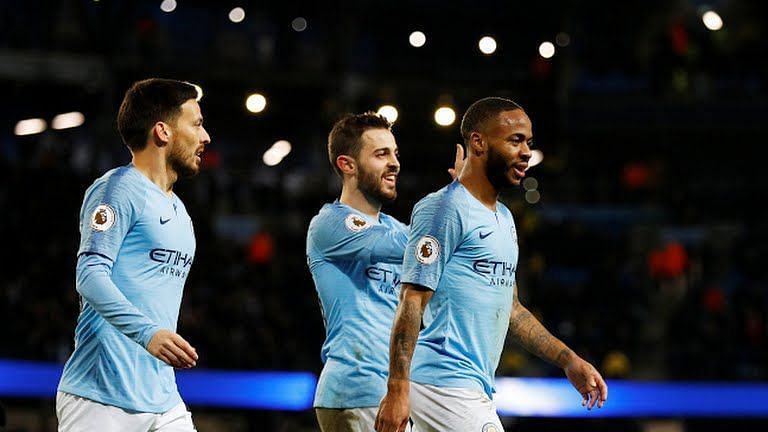 Raheem Sterling celebrating City&#039;s sixth goal with David Silva and Bernardo Silva