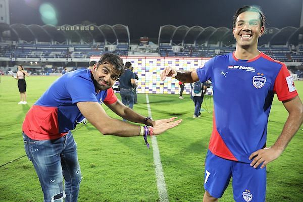 Miku (right) of Bengaluru FC with CEO Parth Jindal