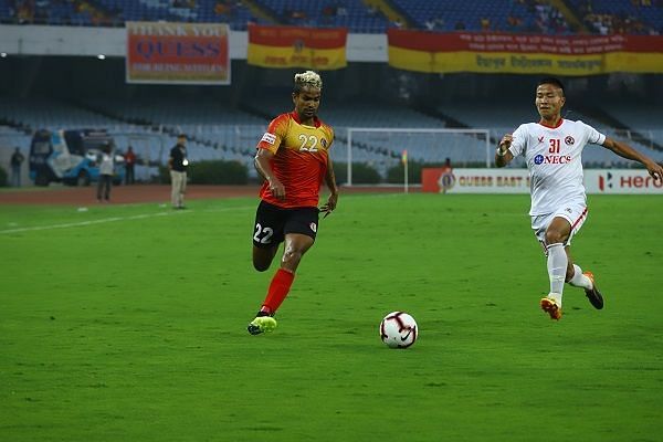 Jobby Justin (left) of East Bengal in action against Aizawl FC
