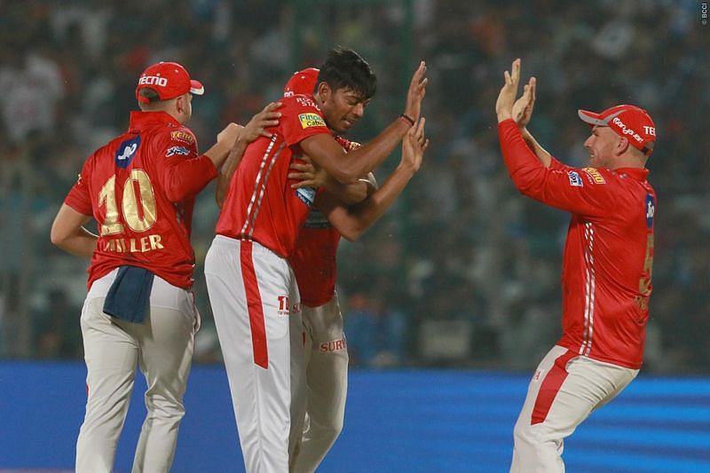 Ankit Rajpoot celebrates with his team-mates