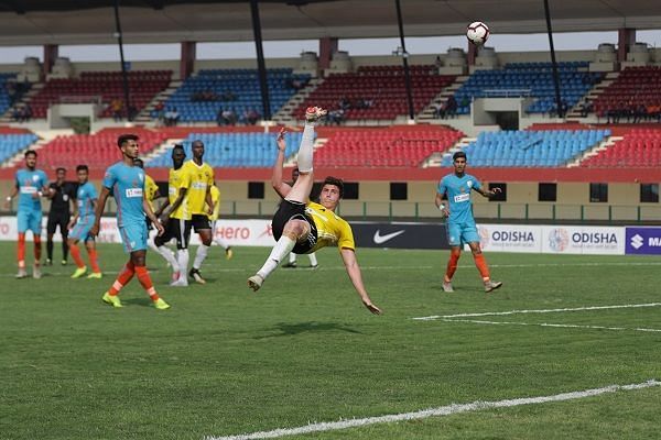 Mason Robertson of Real Kashmir with an overhead kick against Indian Arrows during their I-League match