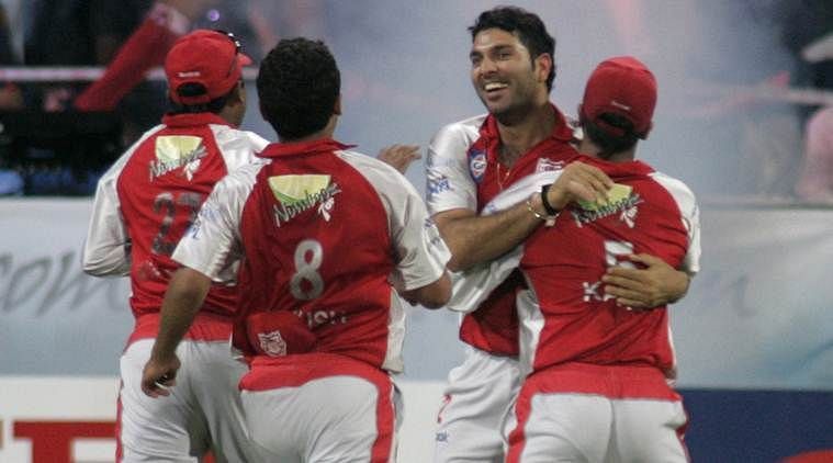 Yuvraj celebrates his hat-trick with teammates