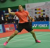 Saina beats Sindhu to claim national title (Lead)