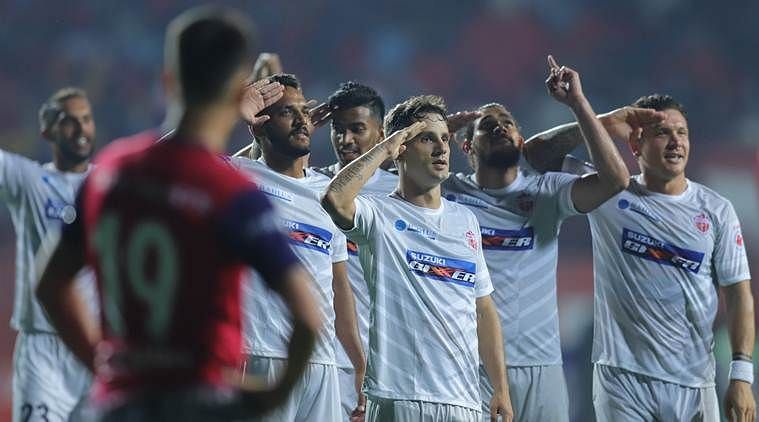 Carlos Calvo watches as Pune City players celebrate [Image: ISL]