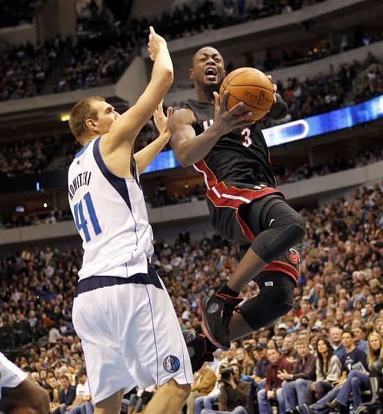 Dwayne Wade and Dirk Nowitzki go at it, one more time