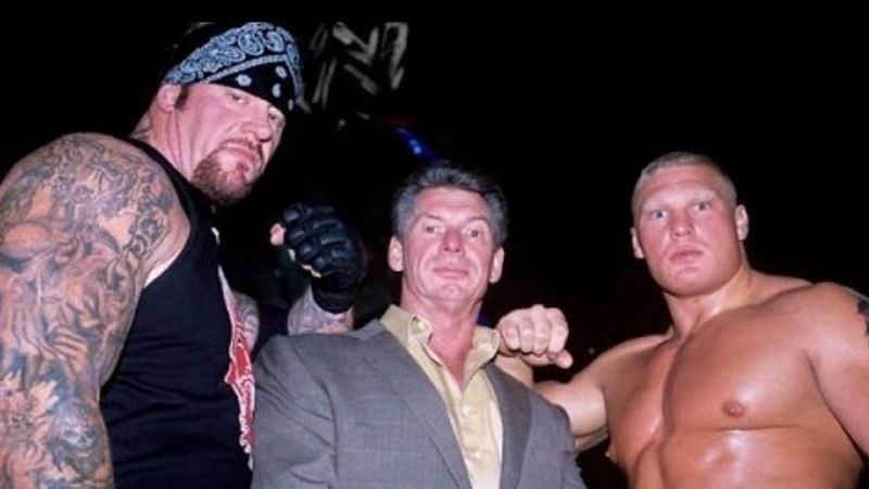 Brock Lesnar with The Undertaker and Vince McMahon
