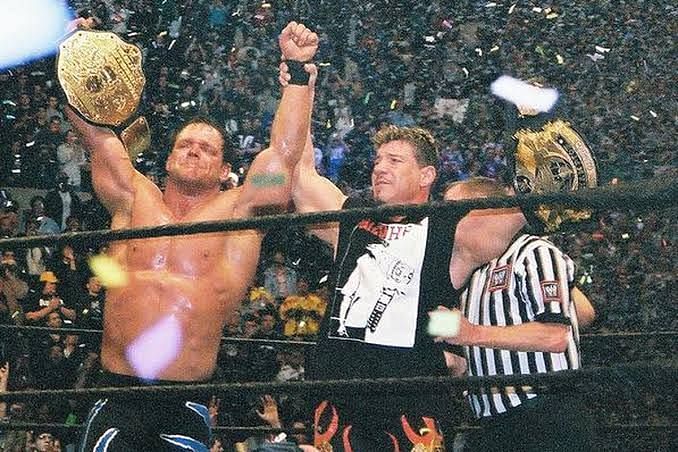 Benoit and Eddie celebrating in one of the greatest WrestleMania moments.