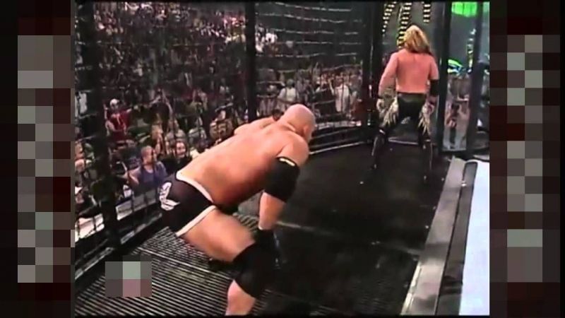 Goldberg prepares to use his trusty spear on a dauntless Chris Jericho