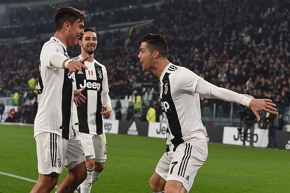 Cristiano Ronaldo and Paulo Dybala celebrate