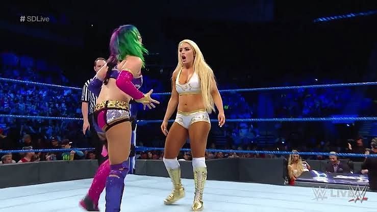 Asuka and Mandy Rose in action