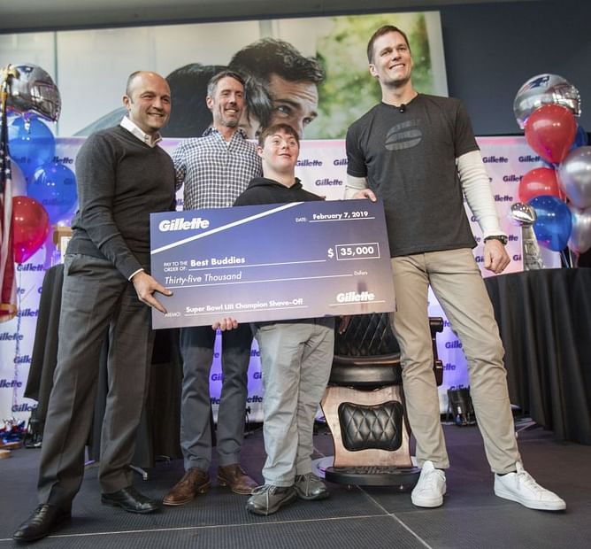 Tom Brady gets his playoff beard shaved for charity