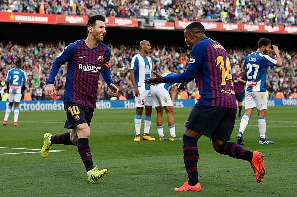 Malcom wheels away to celebrate with Messi after creating his first La Liga assist late on