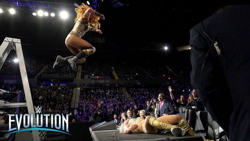 Becky Lynch launches herself off of a ladder at Charlotte during the Evolution main event.