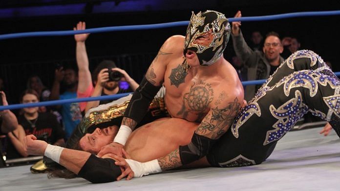 Rey Fenix submitting his opponent