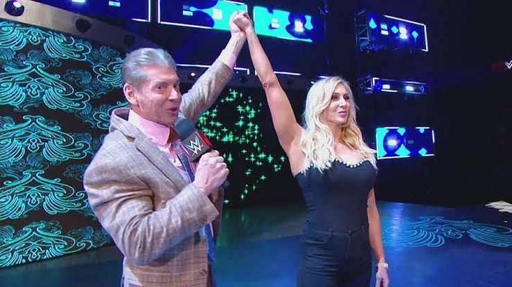 Vince McMahon raising Flair&#039;s hand!