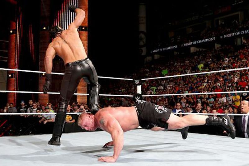 Seth Rollins curb stomps Brock Lesnar