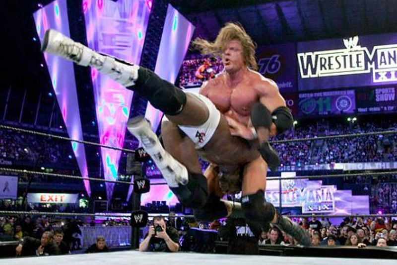 The Game crushed Booker T at WrestleMania 19 to retain the World Heavyweight Championship.