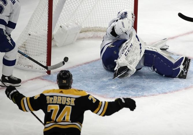 Bruins get late scoring barrage, snap Lightning's streak 4-1