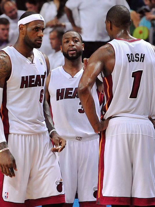 LeBron James, Dwyane Wade and Chris Bosh during a time-out