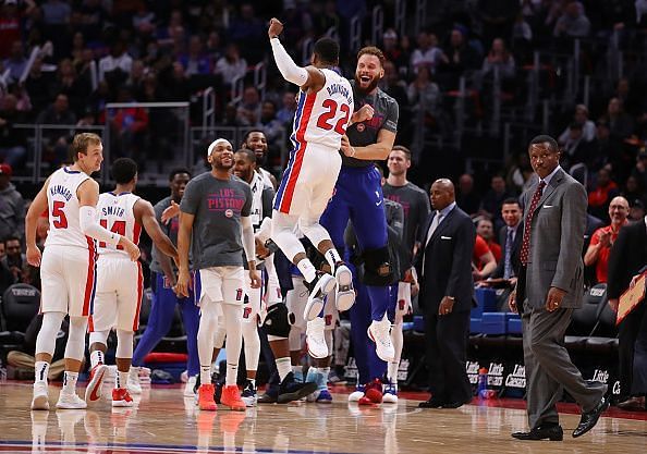 The Detroit Pistons celebrate a victory