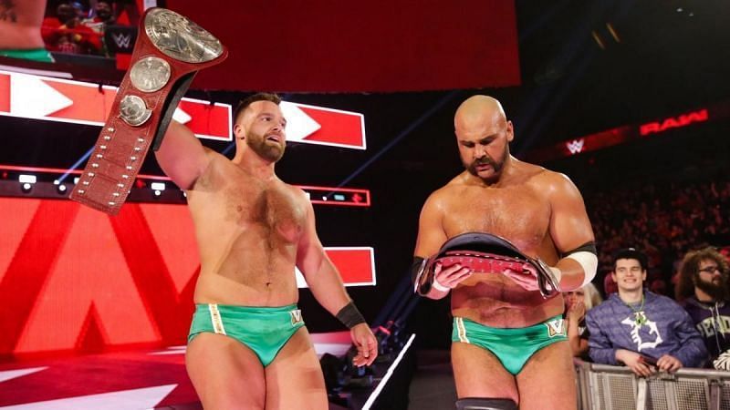 The Revival with the tag team titles
