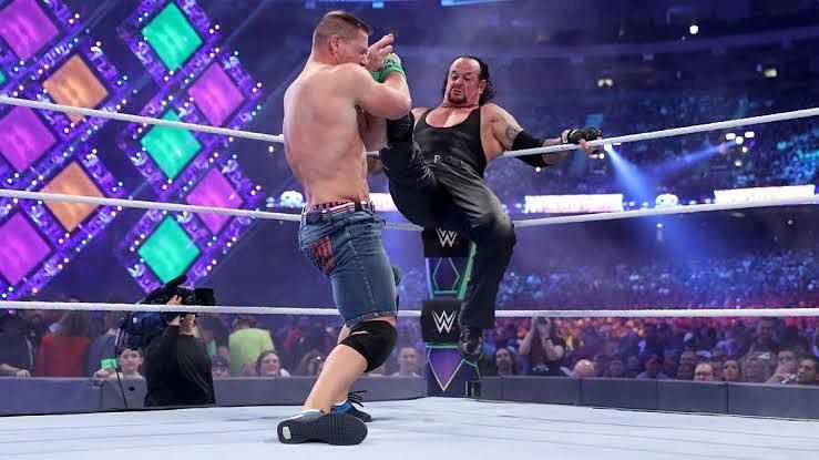 Undertaker and Cena in action at WrestleMania 34