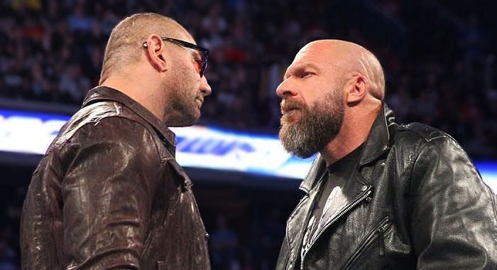 Batista and Triple H staring each other down!