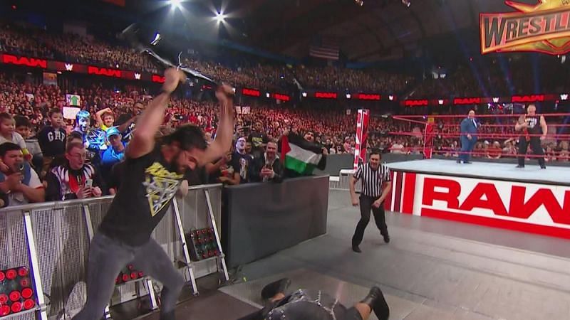 Rollins unloaded on McIntyre with a chair