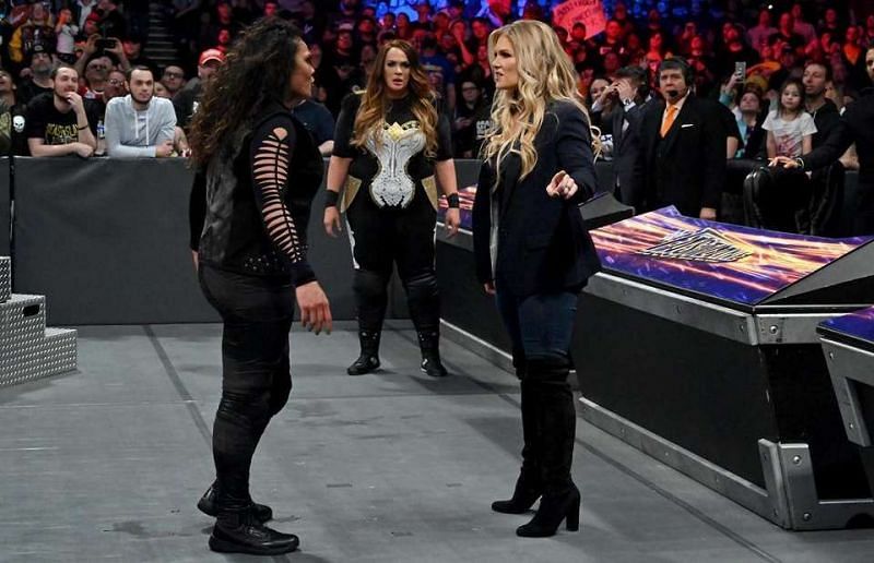 Beth Phoenix stands up to Tamina Snuka at Fastlane, while Nia Jax lurks in the background.