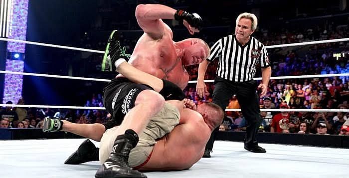 Lesnar mauling John Cena!