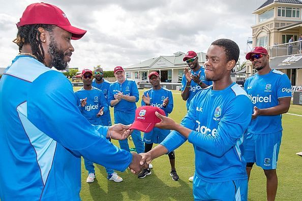 Shimron Hetmyer receiving his ODI cap from Chris Gayle