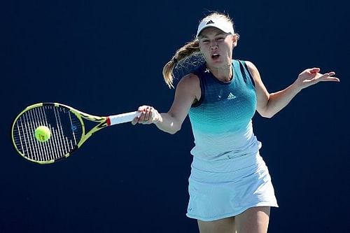 Caroline Wozniacki found a way to reel back in and hold Monica Niculescu at the Miami Open