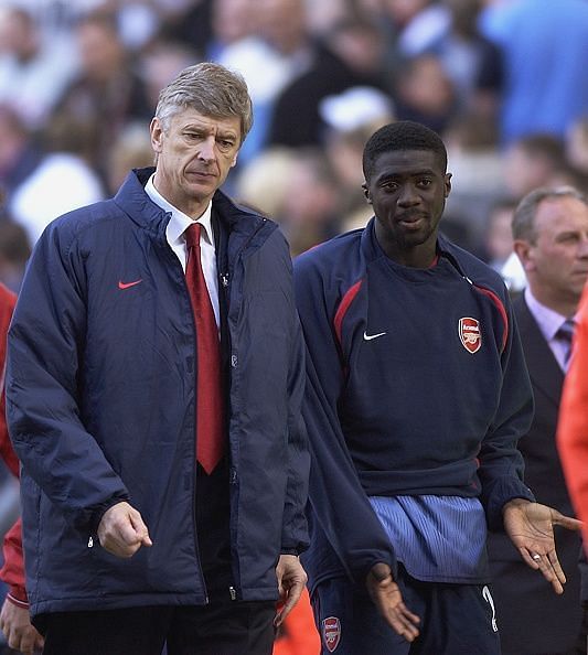 Former Arsenal manager Arsene Wenger and Kolo Toure