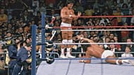 Rick Martel stands on the apron after Santana hit him with a forearm, leading to the break up of Strike Force