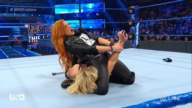 Becky Lynch destroyed Charlotte Flair with one good leg.