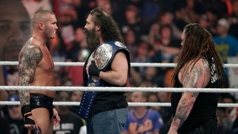 Harper (middle) with Randy Orton (left) and Bray Wyatt (right)