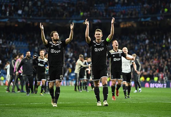 Matthijs de Ligt (right) celebrates after knocking Real Madrid out of Champions League