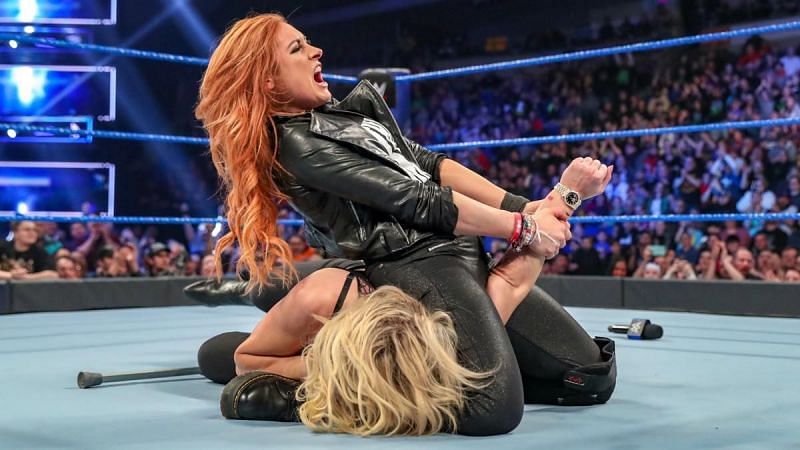 Becky Lynch dis-armed Charlotte