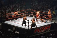 The Highlanders ( center ) at a live event against Cade & Murdoch and the World's Greatest Tag Team.