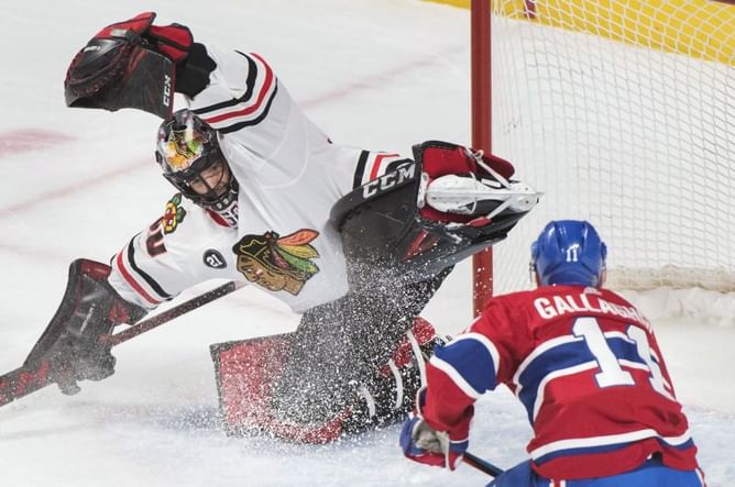 Crawford makes 48 saves in Blackhawks' 2-0 win vs. Canadiens