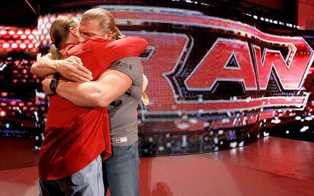 Shawn Michaels and Triple H hugging after his farewell.