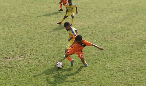 South United FC's Sudipta competes for the ball