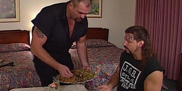 Big Boss Man feeds Al Snow a delicious roast--which happens to be Snow&#039;s dog Pepper .