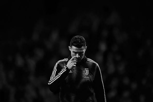 Ronaldo cuts a forlorn figure after losing to Atletico in the UCL first leg