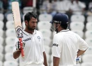 Image result for cheteshwar pujara and ms dhoni