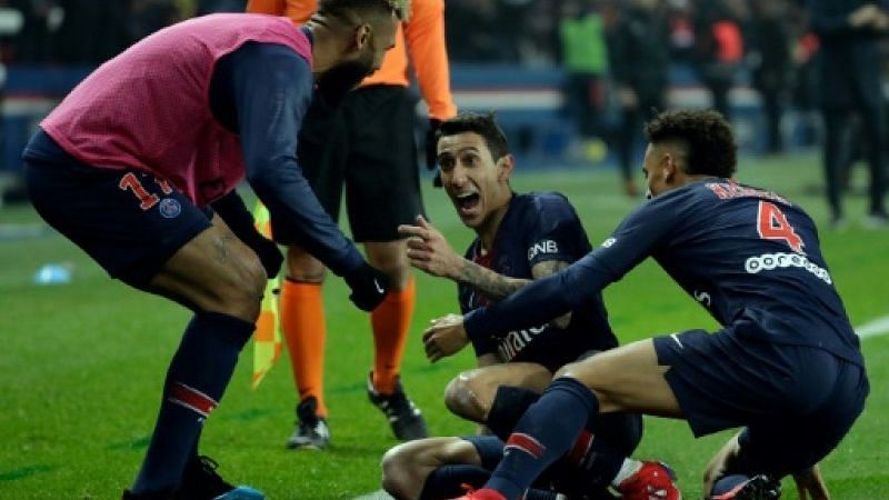 di Maria celebrates with his teammates during their 3-1 win over Marseille before the international break