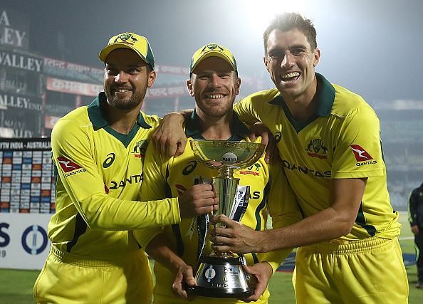 Finch and his teammates pose with the trophy; India v Australia - ODI Series: Game 5