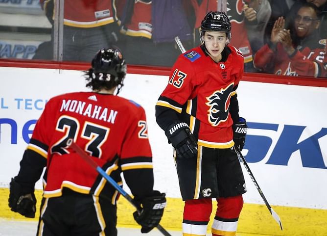 Gaudreau powers Flames past Devils 9-4